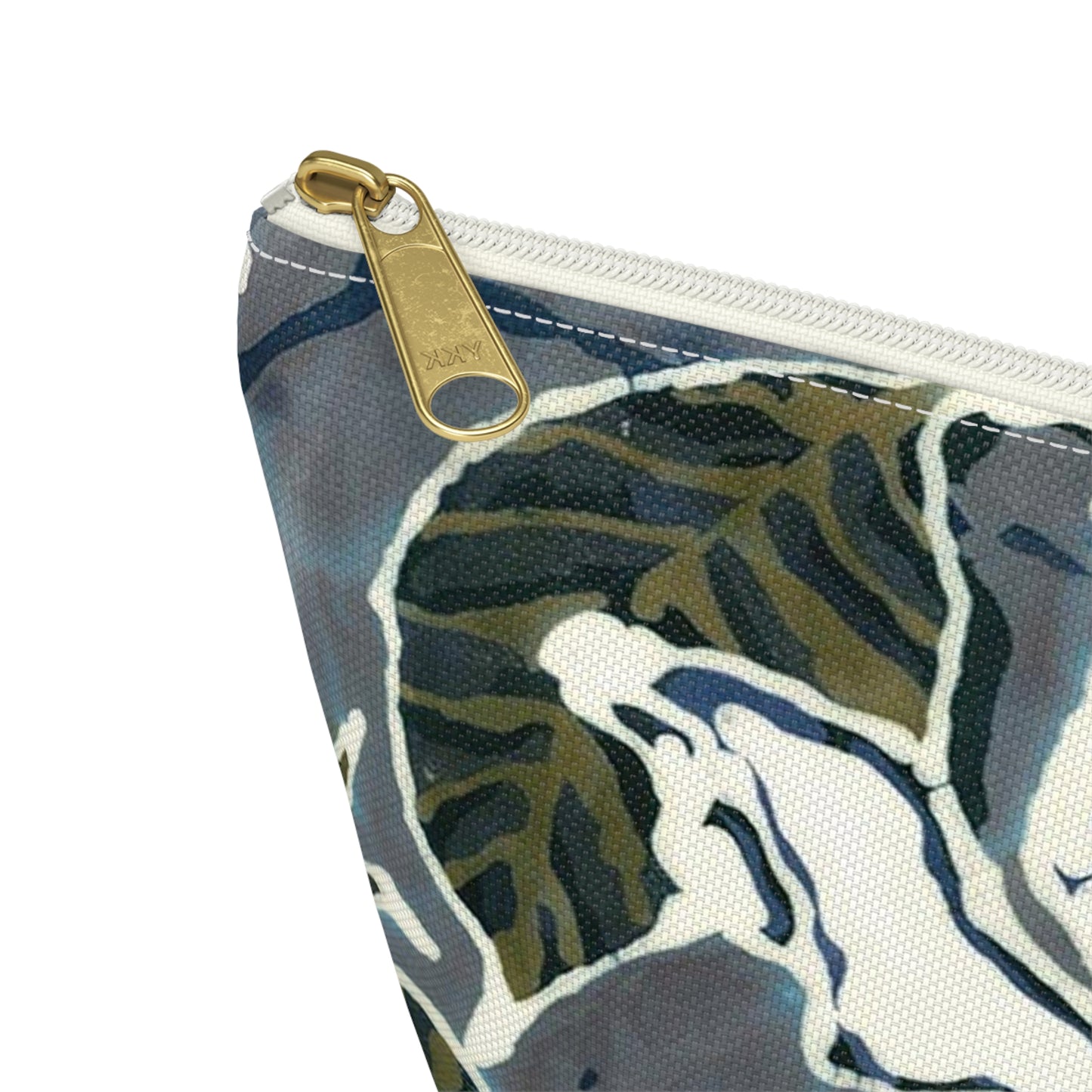 “Artful Carry: Brigg Evans Serti-Batik Pouches & Clutches” - Magnolia