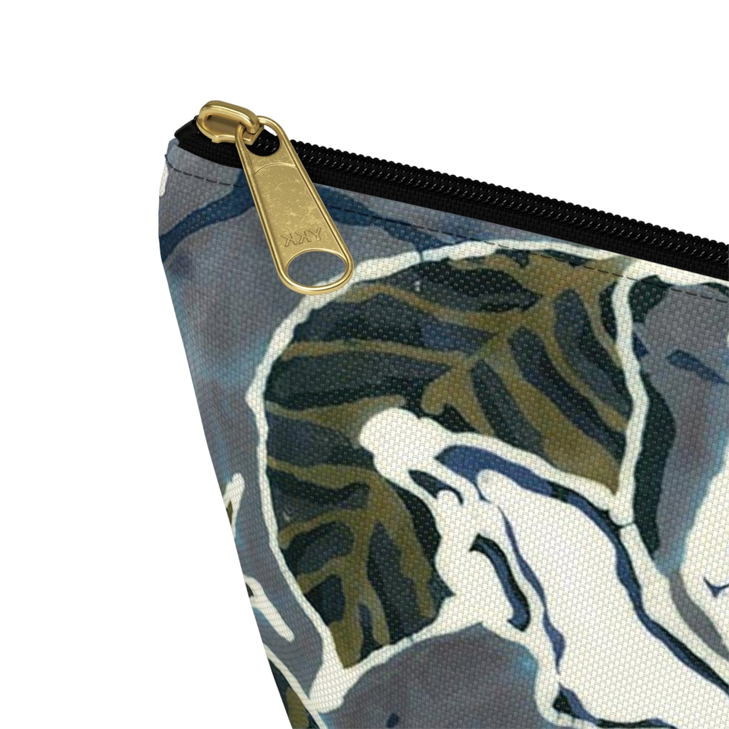 “Artful Carry: Brigg Evans Serti-Batik Pouches & Clutches” - Magnolia