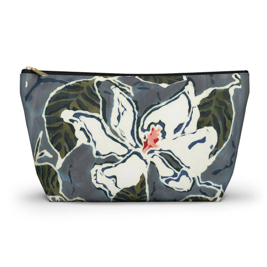 “Artful Carry: Brigg Evans Serti-Batik Pouches & Clutches” - Magnolia