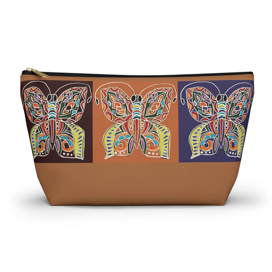 “Artful Carry: Brigg Evans Serti-Batik Pouches & Clutches” - Papillon