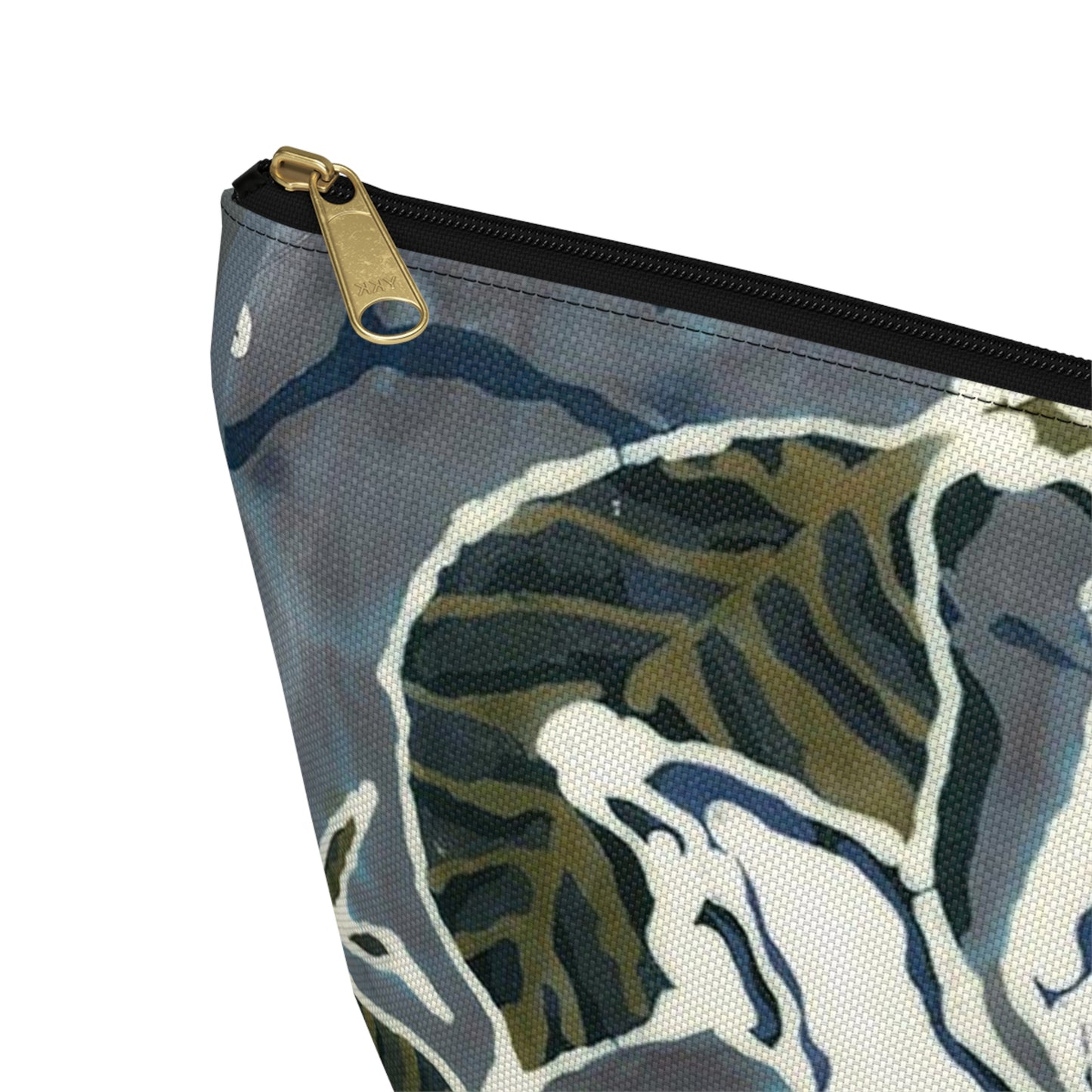“Artful Carry: Brigg Evans Serti-Batik Pouches & Clutches” - Magnolia